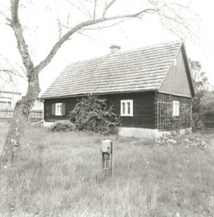 Daubitz (Rietschen-Daubitz), Dorfstraße 34. Blockhaus (1870). Gartenansicht