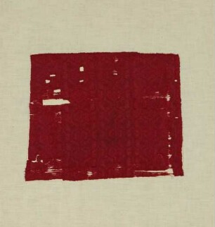 Gewebefragment aus rotem Seidendamast