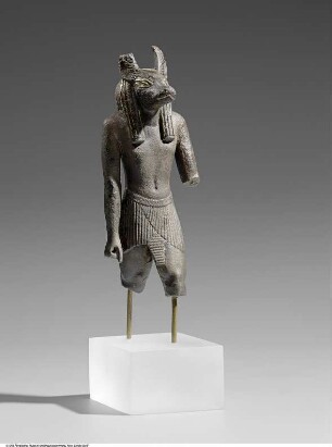 Statuette des schakalköpfigen Gottes Anubis in Stand-Schreit-Haltung