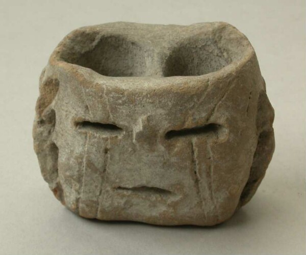 Clay head as double incense burner