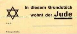 Antisemitischer Maueranschlag mit Hinweis auf jüdische Hausbewohner