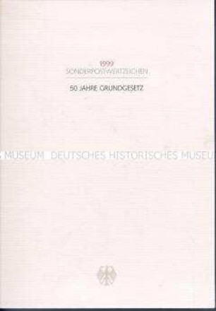 Schmuckblatt mit Sonderbriefmarke und Ersttags-Sonderstempel zum 50. Jahrestag des Grundgesetzes