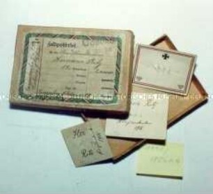 Feldpostpäckchen mit Haarlockenkärtchen