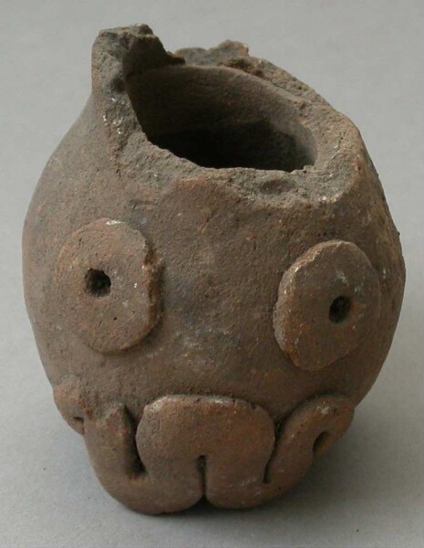 Fragment of a clay vessel