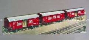 Werbeaufsteller mit Werbeaufdruck für "Zuban"-Zigaretten (Motiv: Zuban-Eisenbahnwaggons)