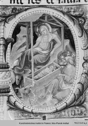 Textseite mit Bordürenrahmen und historisierter Initiale P(uer natus est), darin Geburt Christi - Diurno Domenicale