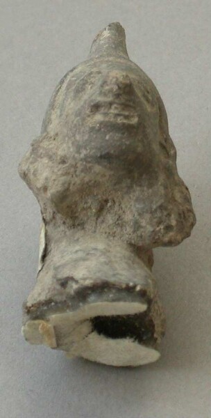 Fragment of a clay rattle (clay head)