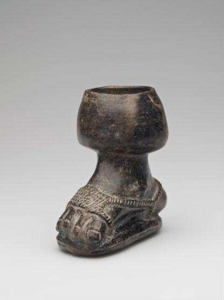 Vessel; representation of a foot with a sandal