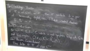Left orders, transverse actions, and ordered foliations