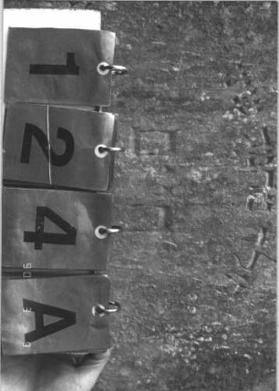 Grabstein 124 (Index: 99786804) Zustand: Inschrift leicht verwittert Maße HxBxT: 77x53x10 cm Besonderheit: Kindergrab: Grabstein 124A