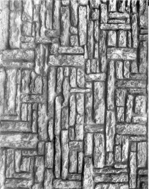 Horizontal und vertikal angeordnete Steine einer Mauer