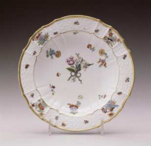 Teller mit Holzschnittblumen, indianischen Blüten, Schmetterlingen und Vögeln