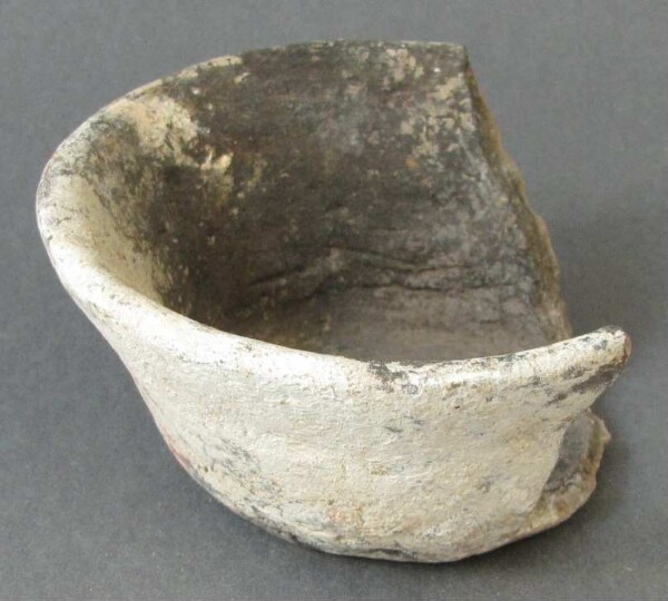 Fragment of a clay vessel