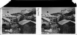 Dorf im Schnee mit Corvatsch