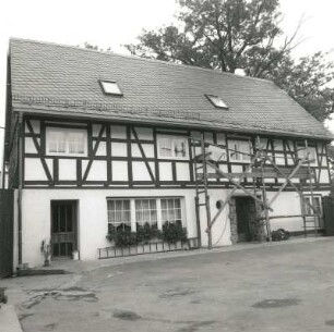 Schlunzig, Hauptstraße 15. Dreiseithof. Wohnstallhaus (1868)