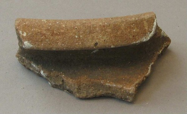 Fragment of a clay vessel