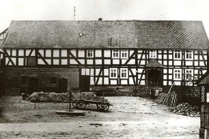 Wohnhaus (Fachwerk, Einhaus, erweitert mit Scheune); Burgwald, Hugenottenstraße 14
