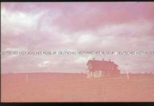 Landschaft mit Haus