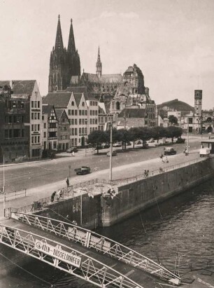 Köln. Blick auf die Frankenwerft. Im Hintergrund die Türme des Kölner Doms (Hohe Domkirche St. Petrus)