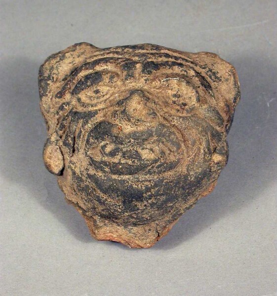 Fragment of a clay vessel