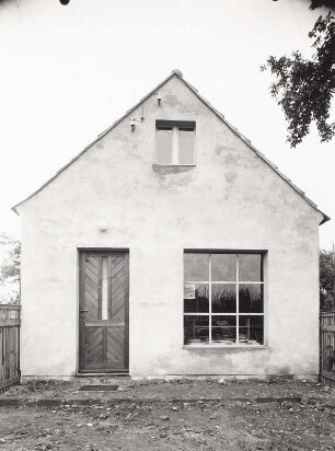 Siedlungshaus mit Laden