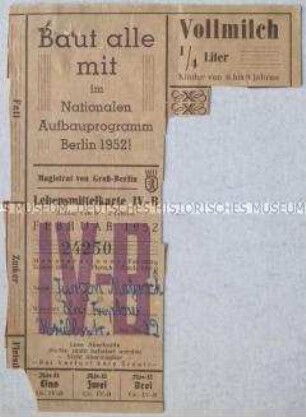 Fragment einer Lebensmittelkarte des Magistrats von Groß-Berlin aus dem Jahr 1952 für Kinder von 6-9 Jahren mit Werbung für das Nationale Aufbauprogramm