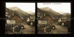 Dorfstraße mit Passanten in Nevache, Westalpen