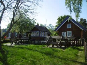 Preila: Kurische Holzhäuser