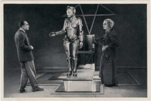 Alfred Abel als Johann "Joh" Fredersen, Brigitte Helm als Maschinenmensch und Rudolf Klein-Rogge als Erfinder Rotwang im Stummfilm "Metropolis" von Fritz Lang. Ufa, 1925/1926