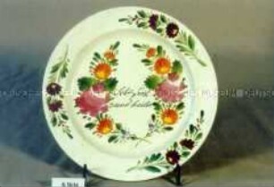 Teller, Blumendekor und Aufschrift "Lebe froh und heiter"
