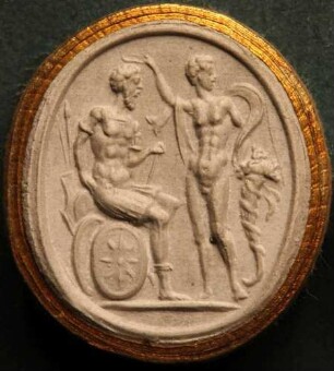 Commodus auf Waffen sitzend und ein Genius (Daktyliothek, Supplement)