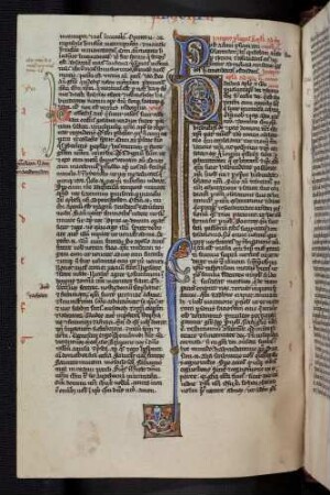 Zierinitialen mit Ranken und Drachen geschmückt.