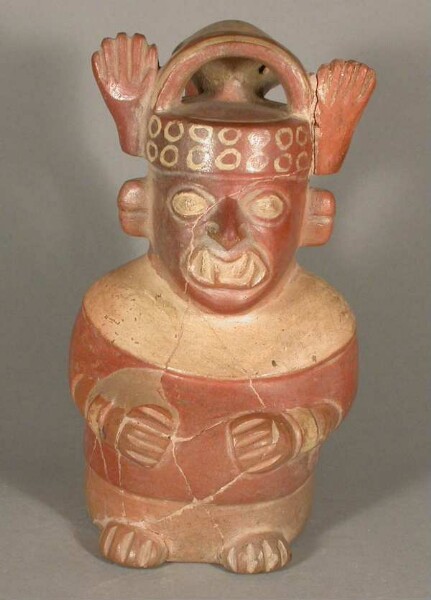 Anthropo-zoomorphic figure with feline teeth