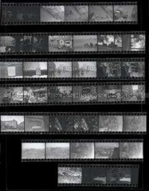Schwarz-Weiß-Negative mit Aufnahmen aus Schwerin (u.a. mit Flüchtlingen, Schloß als Behelfs- und Seuchenkrankenhaus, Stadtbilder von oben etc.)