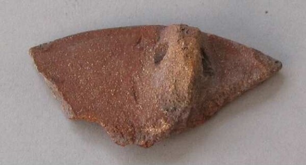 Fragment of a clay vessel