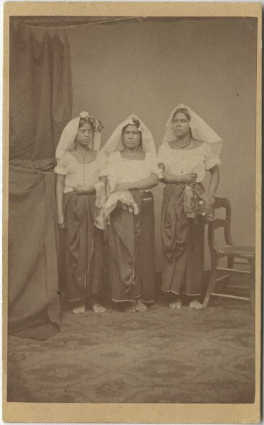 Three Zoque women in traditional costume