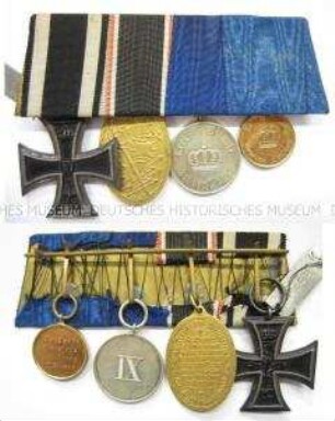 Große Ordensspange mit vier Dekorationen: Eisernes Kreuz 2. Klasse, Kyffhäuser-Denkmünze, Preußische Dienstauszeichnung 2. Klasse für 9 Dienstjahre sowie Landwehr-Dienstauszeichnung 2. Klasse