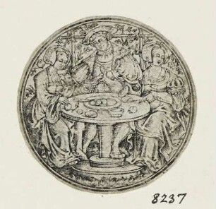 Junger Mann und zwei Mädchen in Gartenlaube