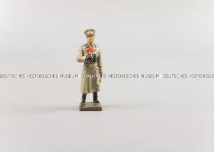 Massefigur: General mit Fernglas in der Rechten (rechter Arm ehemals beweglich), in der Linken eine Karte haltend