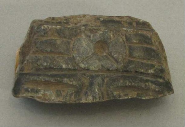 Stone head (fragment)