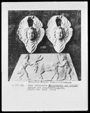 Zwei geflügelte Engelsköpfe und Relief mit Putten und einem Ziegenbock