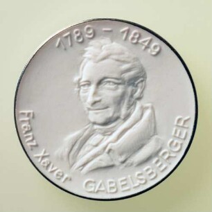 Meisterschaftsmedaille 38. Intersteno-Kongress in Dresden 1989 : Medaillensammlung Stenografische Sammlung. Meisterschaftsmedaille 38. Intersteno-Kongress in Dresden 1989. Porzellan; Durchmesser 51 mm, Gewicht 19,5 g (1989; Porzellanmanufaktur Meißen). Dresden: SLUB R c 0325