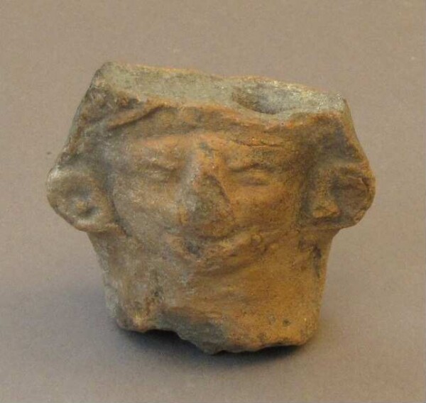 Clay head (fragment)