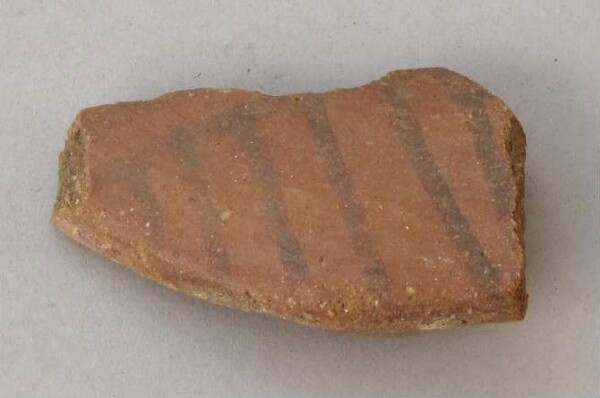 Fragment of a clay vessel