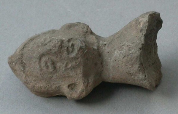 Fragment of a clay rattle (clay head)