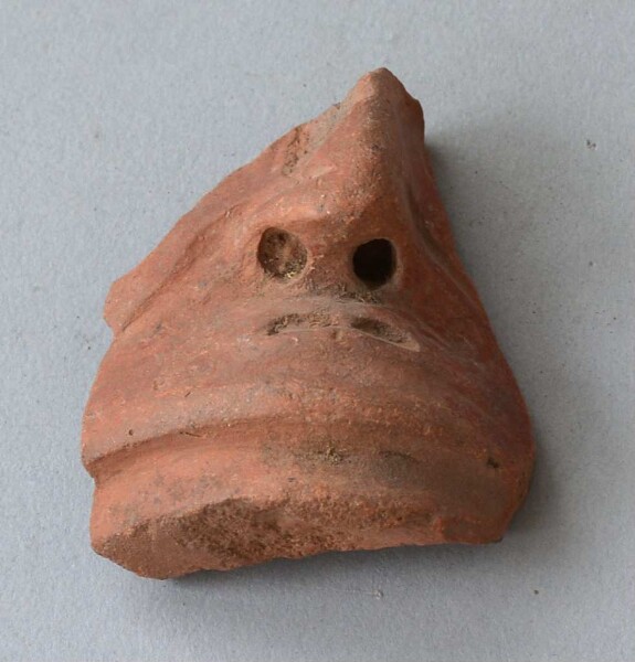 Clay head (fragment)