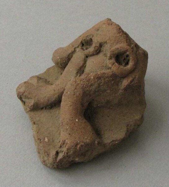 Fragment de figurine d'animal en argile