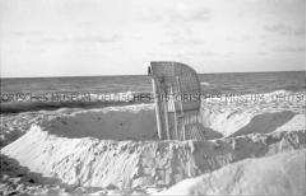 Strandkorb in einer Strandburg am Strand von Köslin