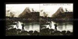 Wanderer am Lerie See mit Gletscher Girose und Meije