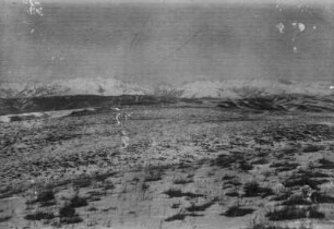 Gebirgslandschaft : Eine schneebedeckte Gebirgslandschaft im Tian Shan Hochgebirge